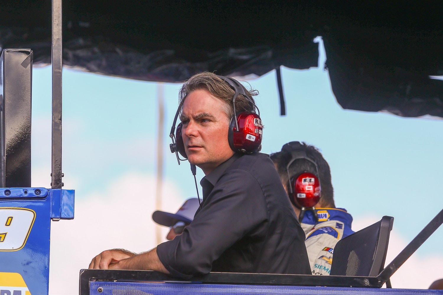 Jeff Gordon watches the final laps of the Quaker State 400 on July 10, 2022, at Atlanta Motor Speedway.