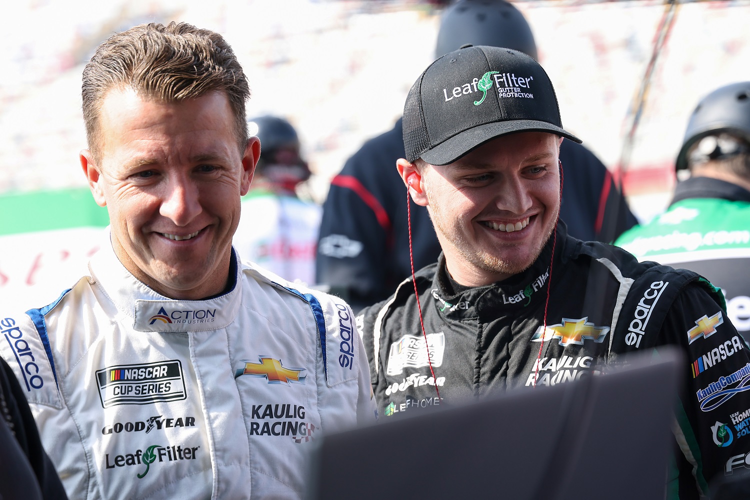 AJ Allmendinger and Justin Haley of Kaulig Racing talk on the grid during  practice for the NASCAR Cup Series Bank of America Roval 400  at Charlotte Motor Speedway on Oct. 8, 2022. | Mike Mulholland/Getty Images