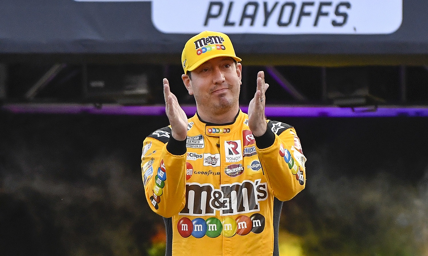 Kyle Busch walks onstage during driver intros for the NASCAR Cup Series Bass Pro Shops Night Race at Bristol Motor Speedway on Sept. 17, 2022.