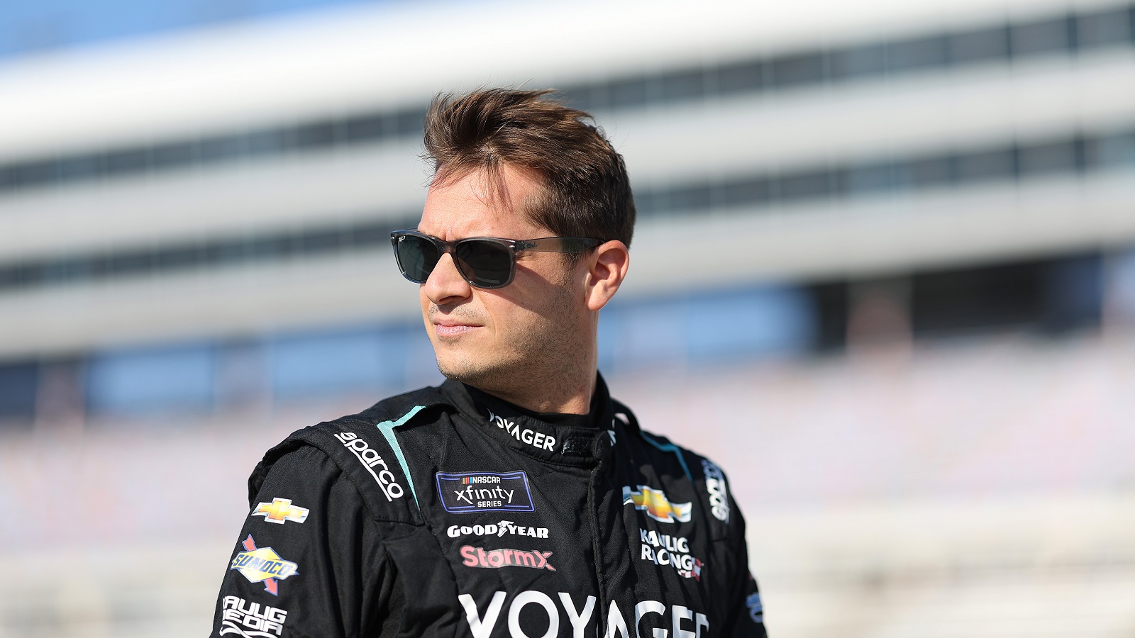 Landon Cassill walks the grid during practice for the NASCAR Xfinity Series Andy's Frozen Custard 300 at Texas Motor Speedway on Sept. 24, 2022.
