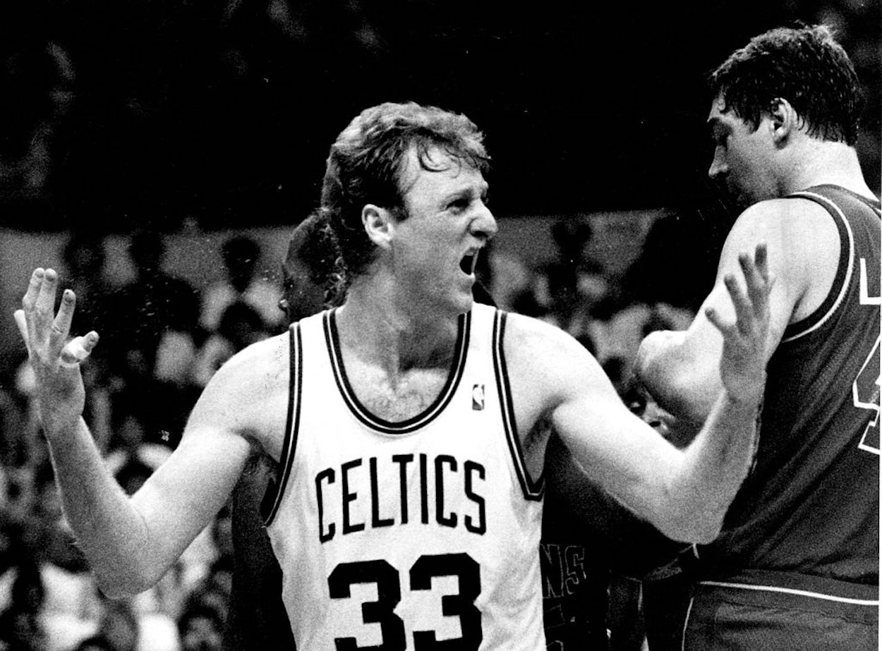 Larry Bird reacts and gestures during a Boston Celtics game.