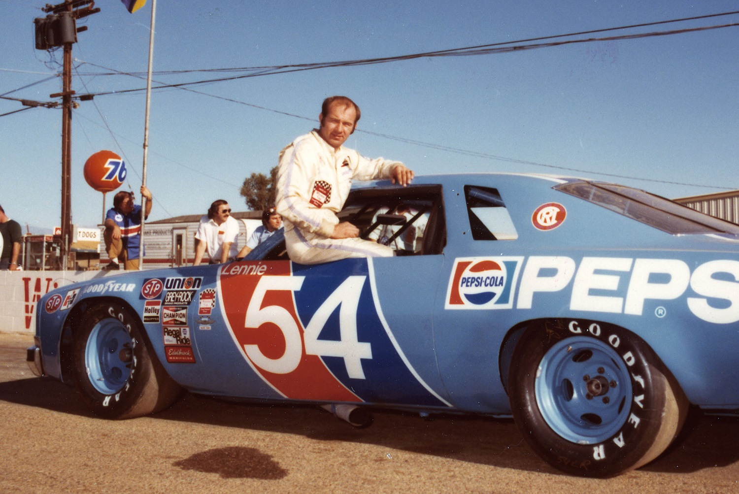 Lennie Pond poses with his Ronnie Elder-owned Chevrolet that he drove on the NASCAR Cup circuit. In 30 races in 1976, 

