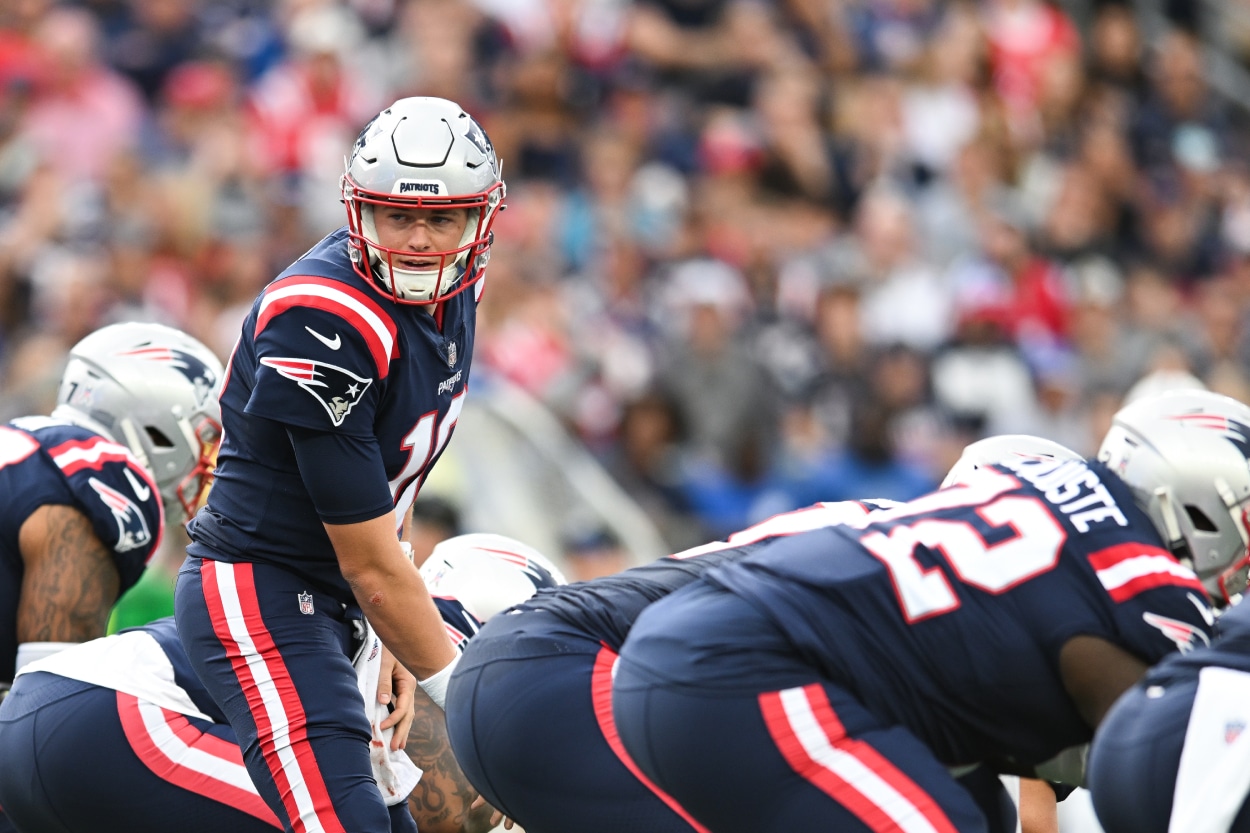 Mac Jones of the New England Patriots lines up before the snap.