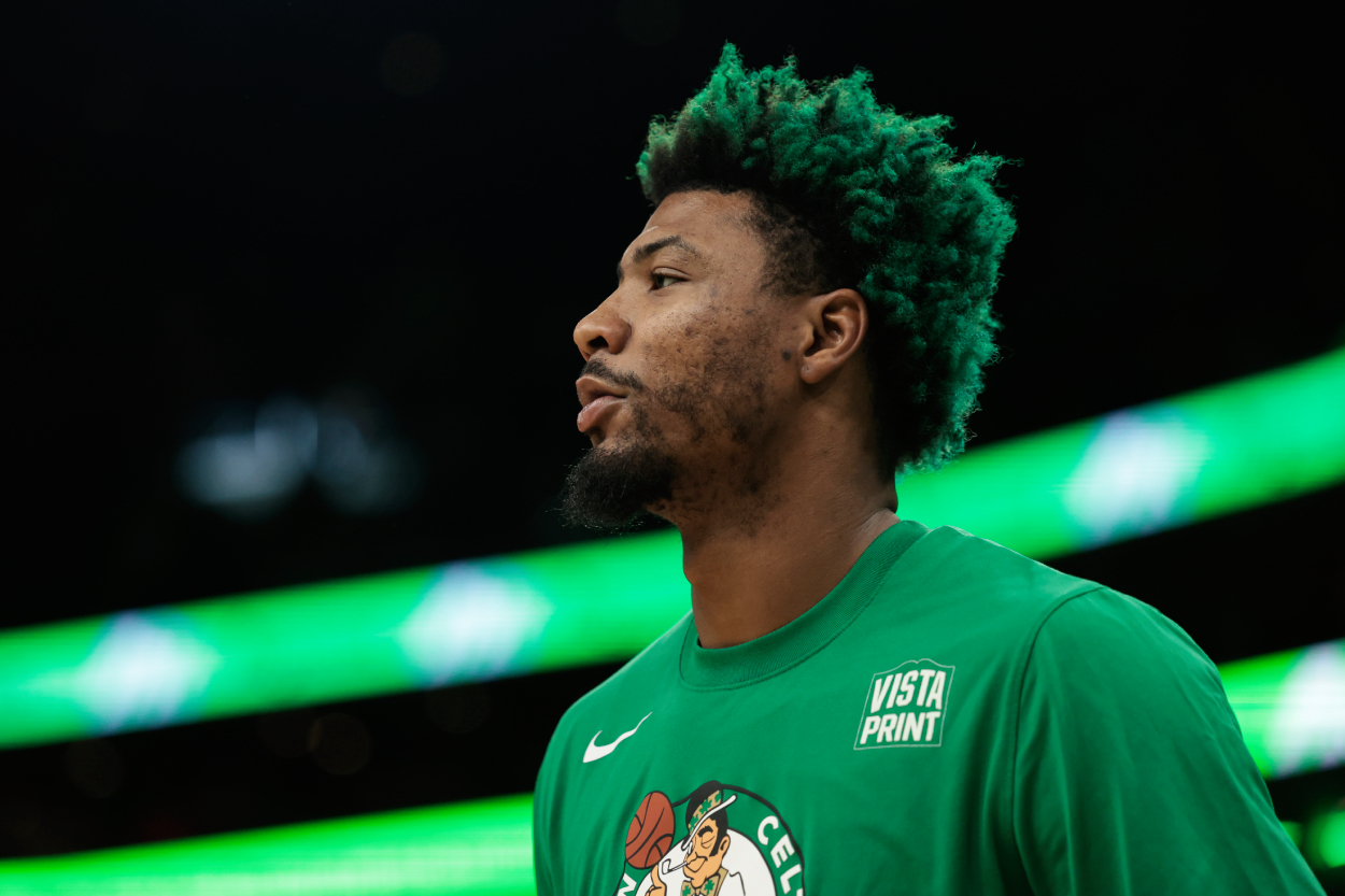 Marcus Smart of the Boston Celtics looks on during warm-ups.