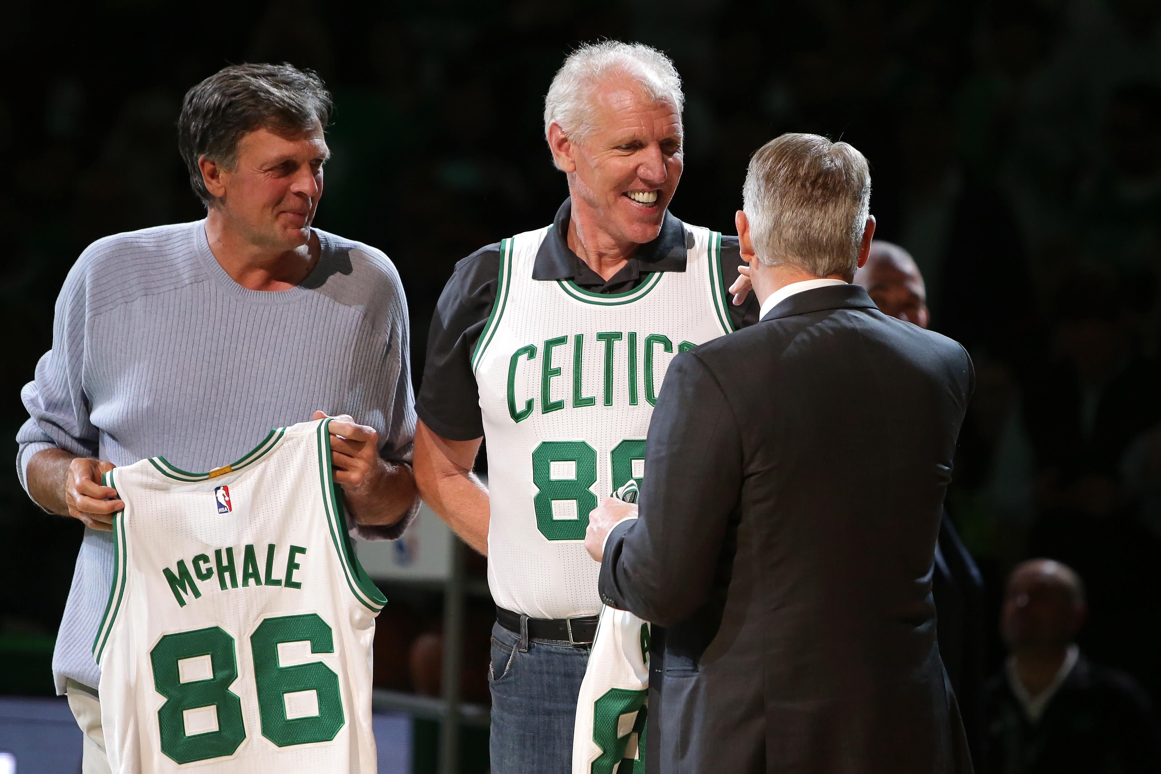 Members of the Boston Celtics 1986 championship team Kevin McHale, Bill Walton and Danny Ainge are honored.