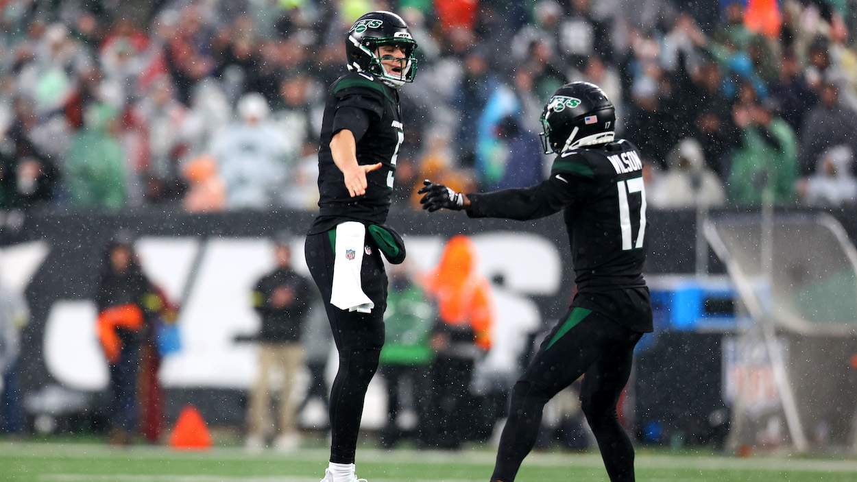 Mike White, in for Zach Wilson, and Garrett Wilson of the New York Jets celebrate in Week 12 win.