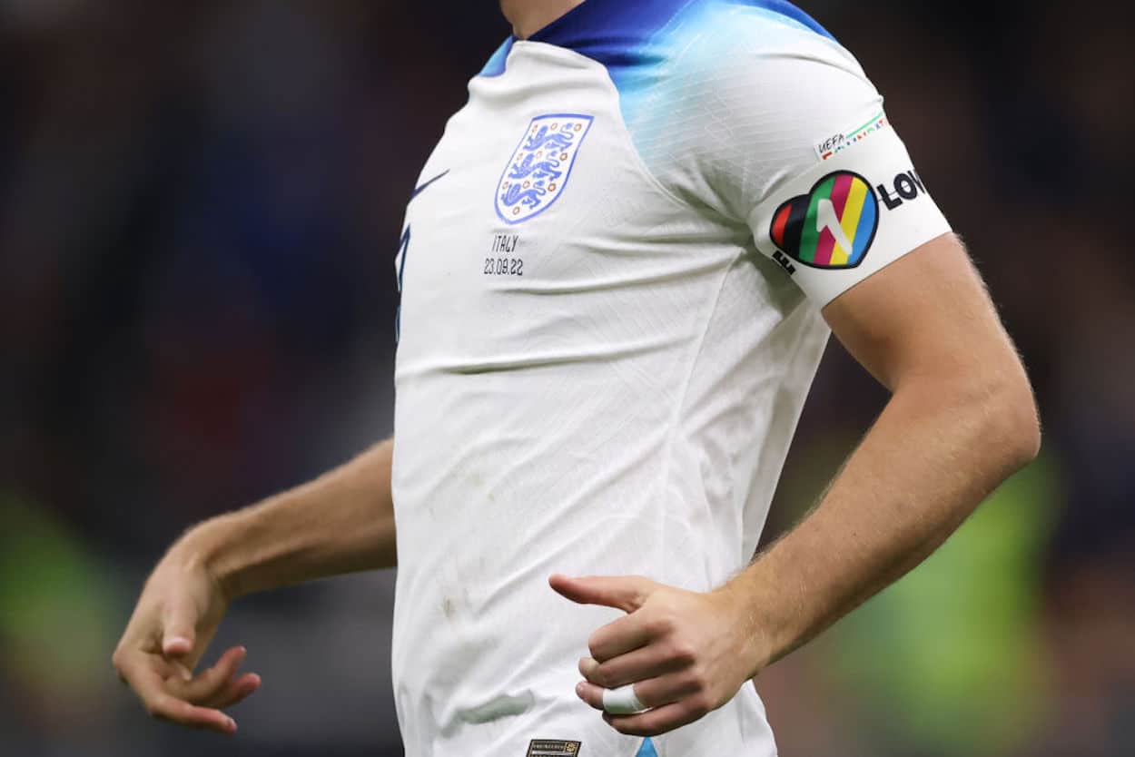 Harry Kane wears a rainbow "One Love" armband as England captian.