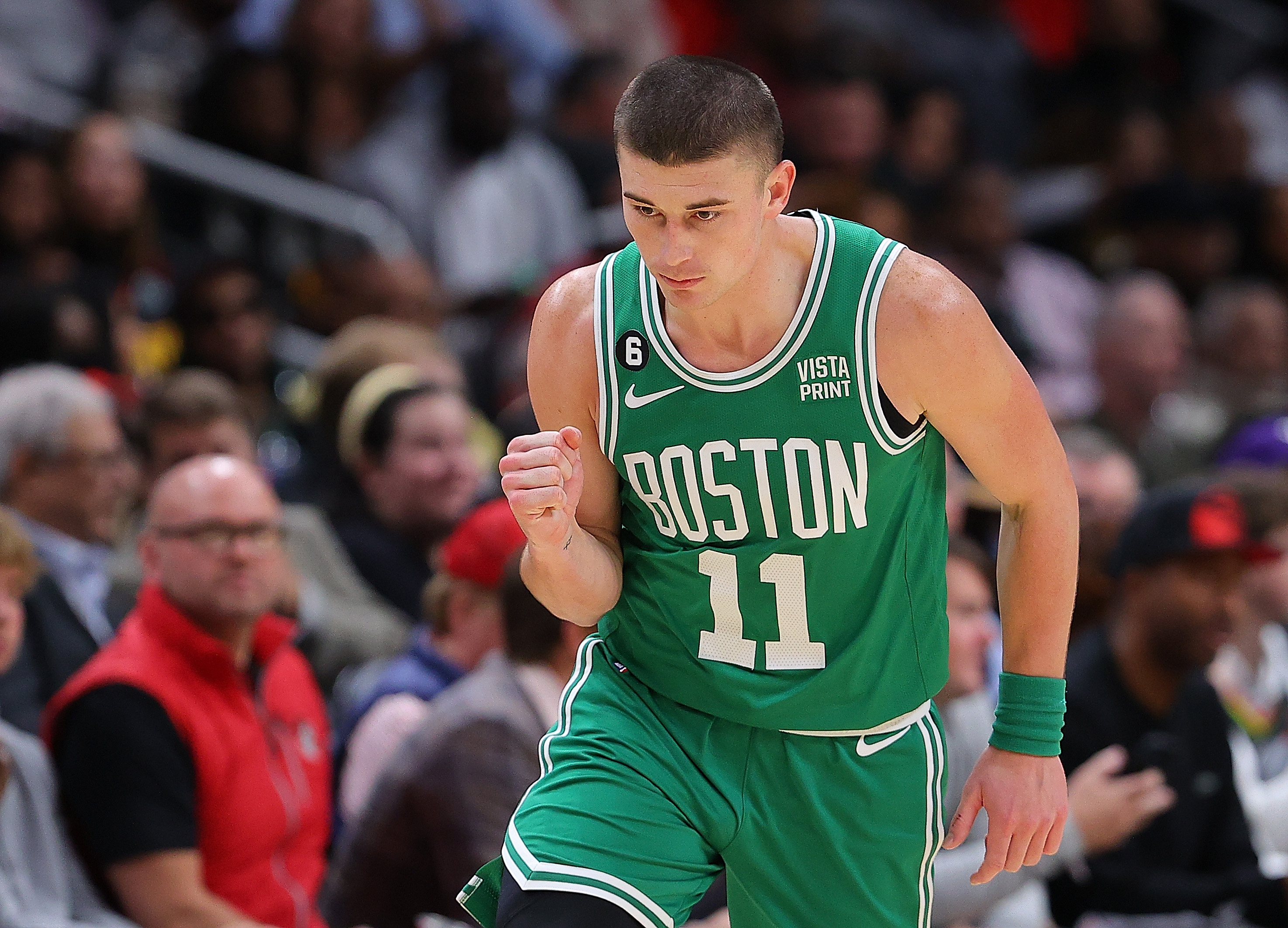 Payton Pritchard of the Boston Celtics reacts after hitting a three-point basket.