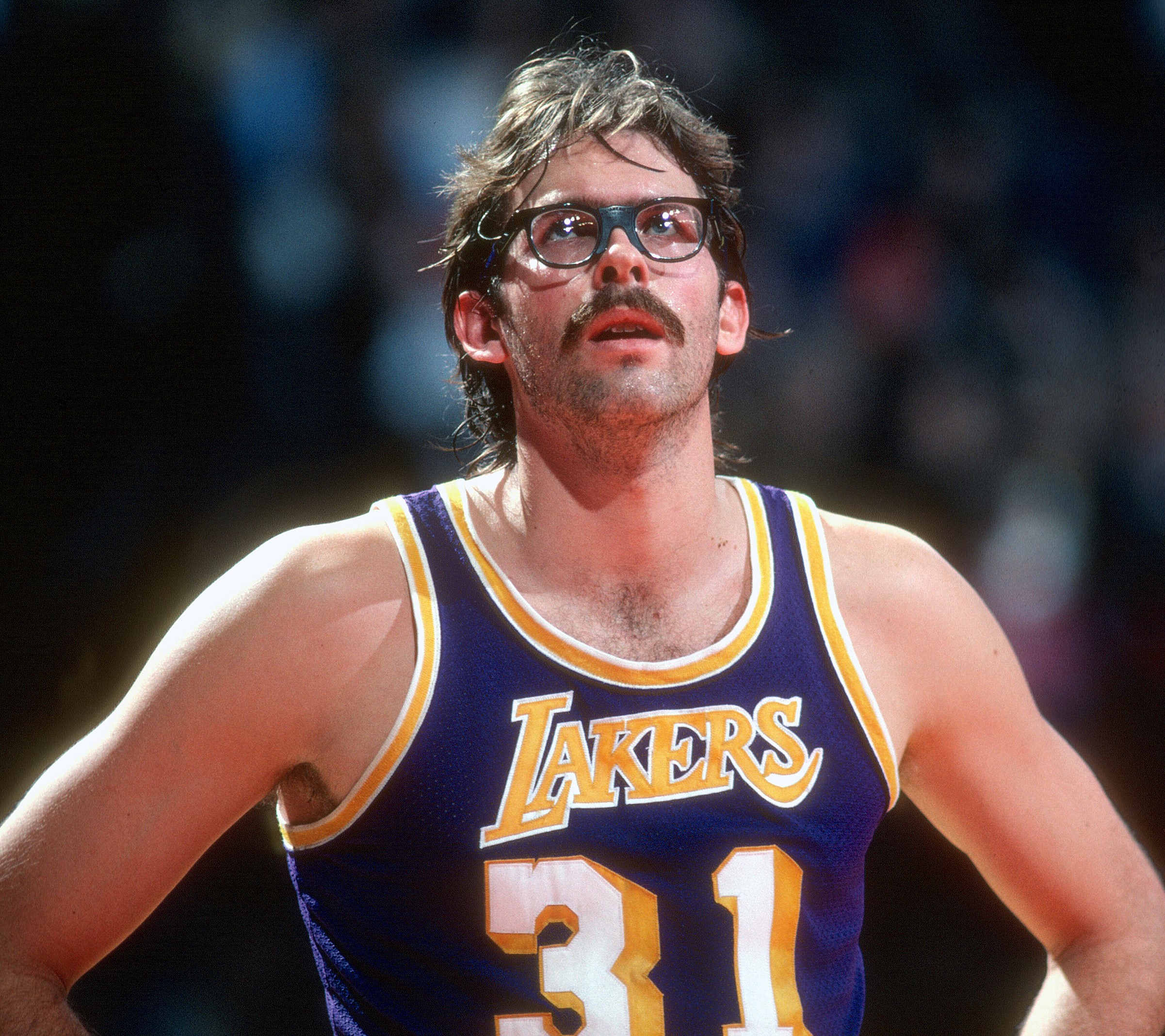 Kurt Rambis of the Los Angeles Lakers looks on against the Washington Bullets.