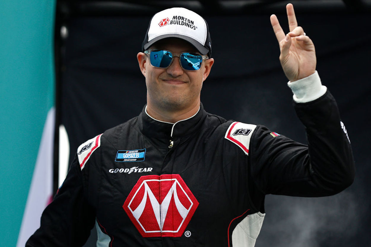 Ryan Preece waves to the crowd ahead of the NASCAR Camping World Truck Series Baptist Health 200.