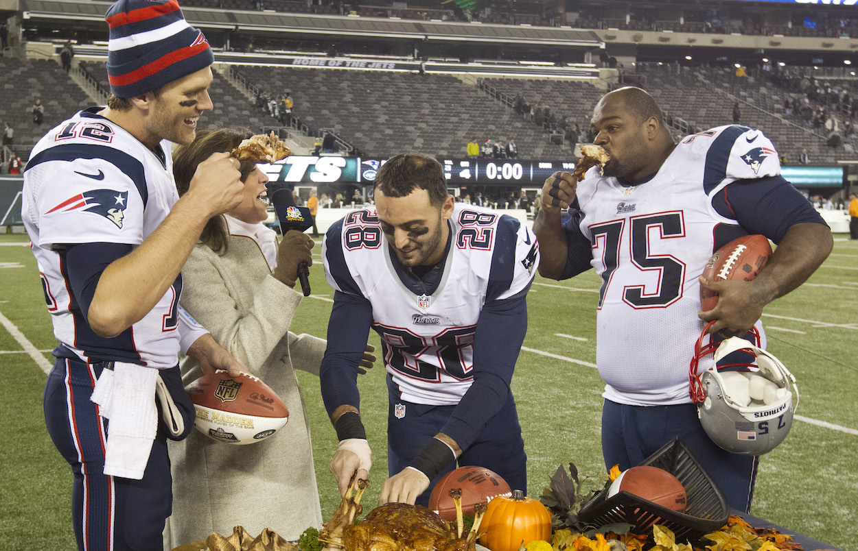 Tom Brady, Steve Gregory, and Vince Wilfork celebrate for the New England Patriots by eating turkey.