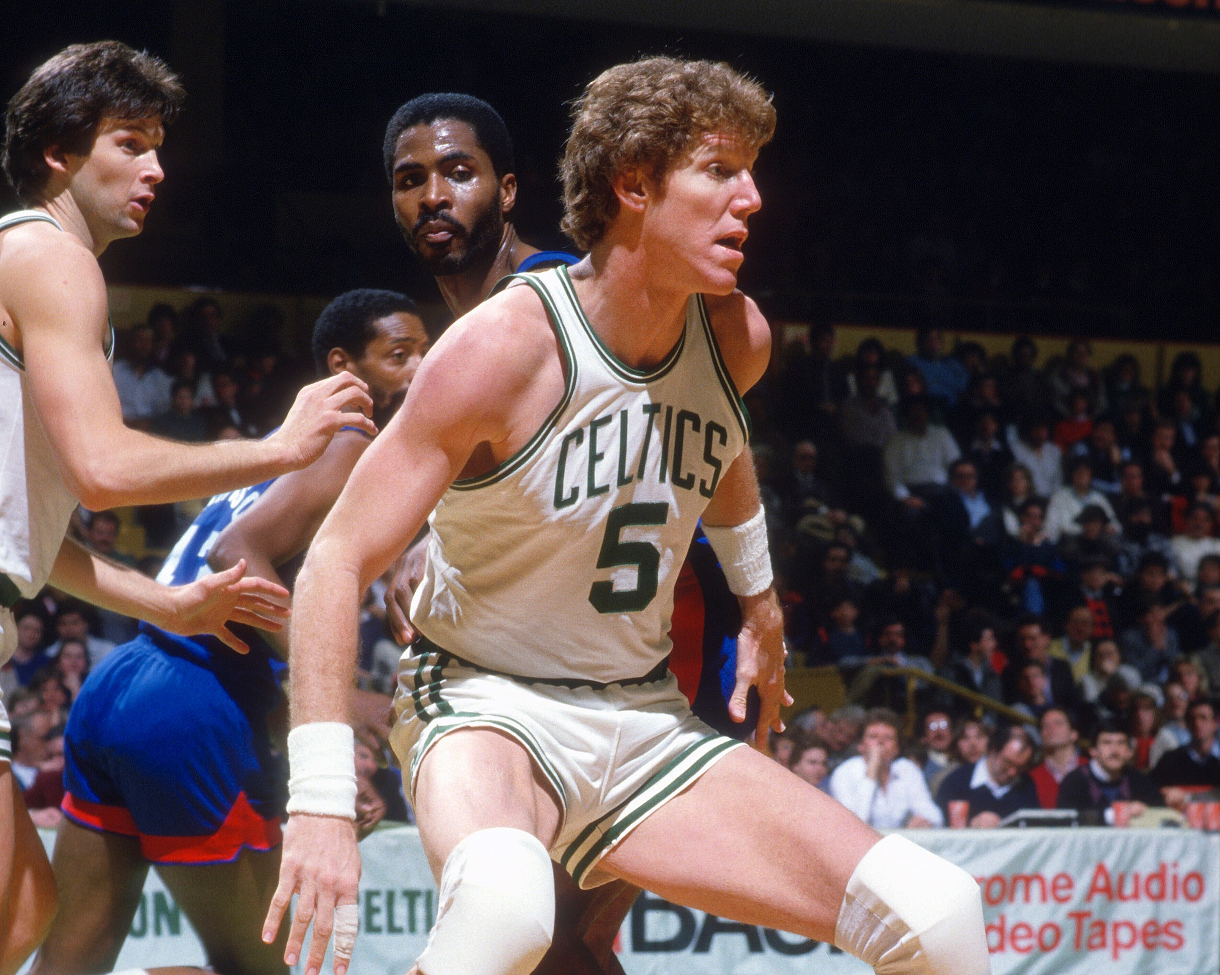 Bill Walton of the Boston Celtics gets position on Buck Williams of the New Jersey Nets.