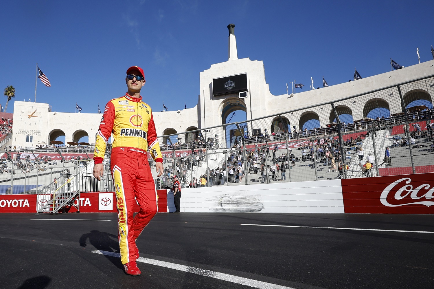 Joey Logano walks the track during driver intros prior to the NASCAR Cup Series Busch Light Clash at the Los Angeles Memorial Coliseum on Feb. 6, 2022.