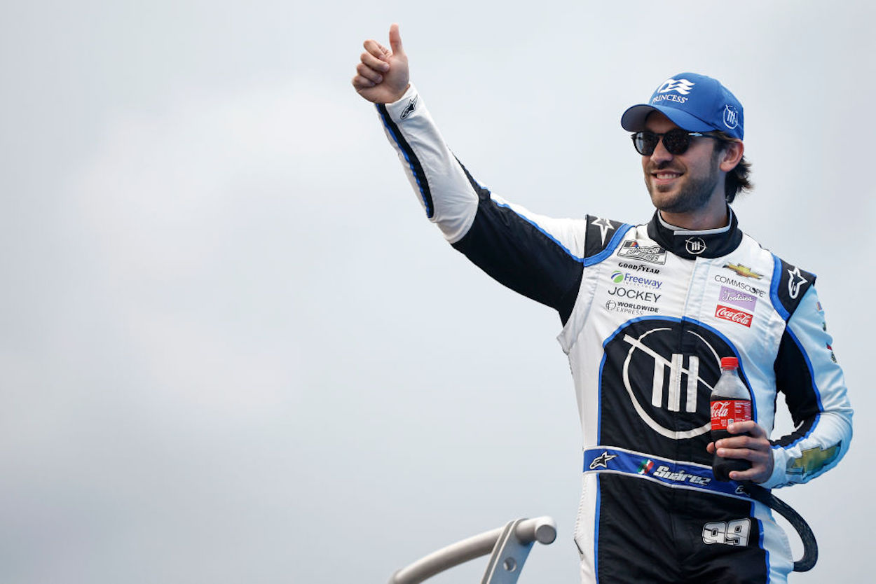 Daniel Suarez gives a thumbs up ahead of the NASCAR Cup Series Go Bowling at The Glen