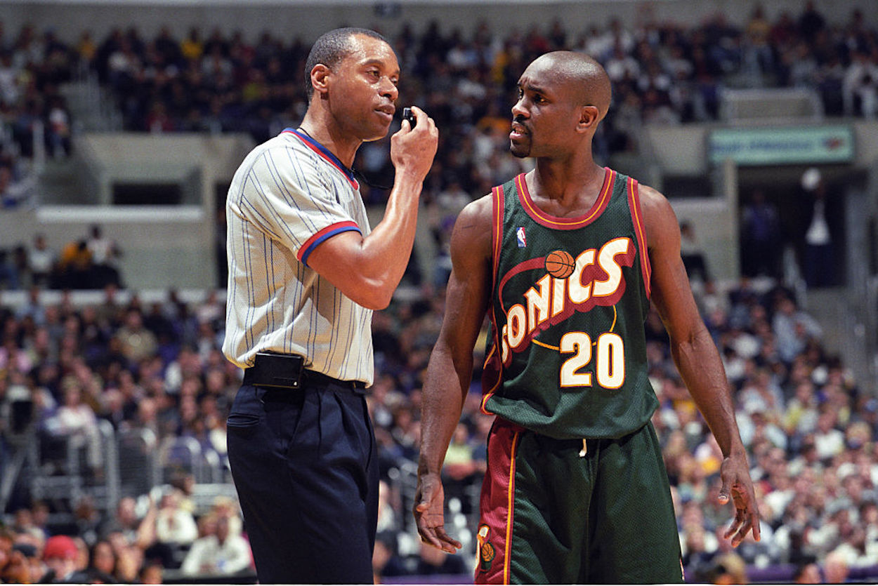 Gary Payton disagrees with a referee during his NBA career.