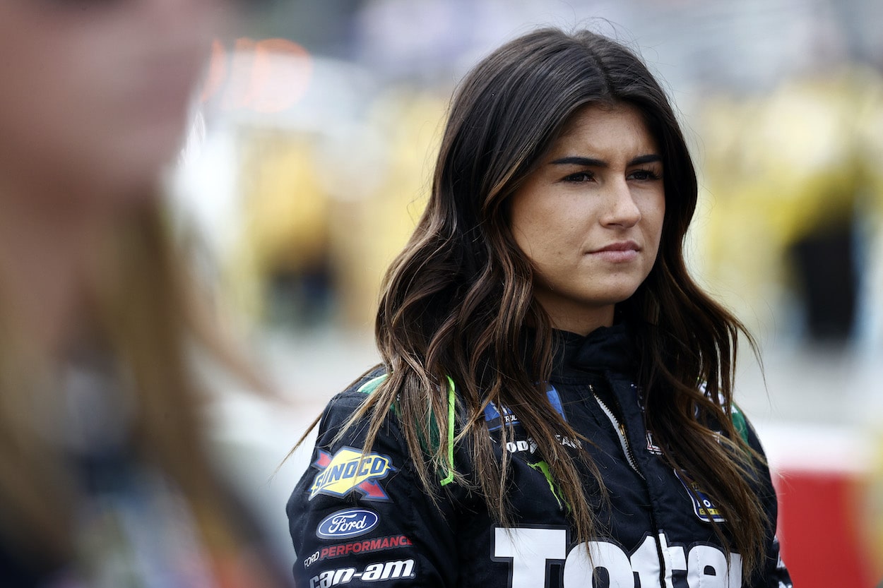 Hailie Deegan waits on grid