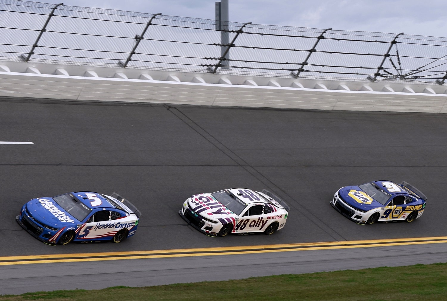 Hendrick Motorsports drivers Kyle Larson, Alex Bowman, and Chase Elliott during practice for the NASCAR Cup Series Daytona 500 at Daytona International Speedway on Feb. 15, 2022.