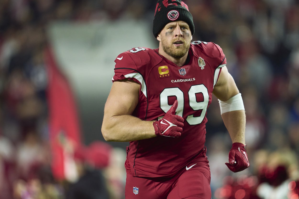 J.J. Watt runs on the field.