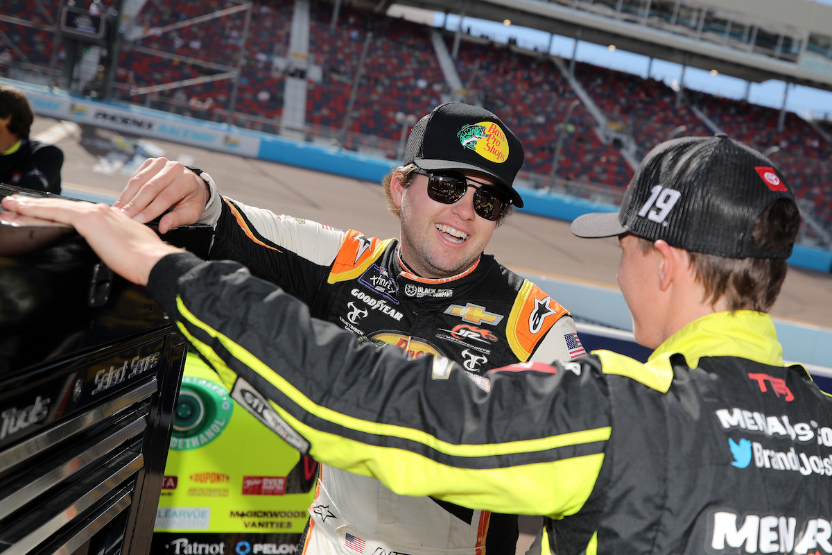 Noah Gragson (L) and Brandon Jones talk on the grid during qualifying for the NASCAR Xfinity Series Championship at Phoenix Raceway