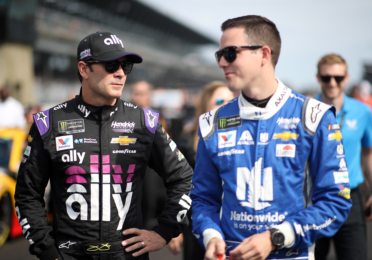 Alex Bowman talks with Jimmie Johnson during qualifying for the NASCAR Cup Series Big Machine Vodka 400 at the Brickyard at Indianapolis Motor Speedway on Sept. 8, 2019 in Indianapolis, Indiana.