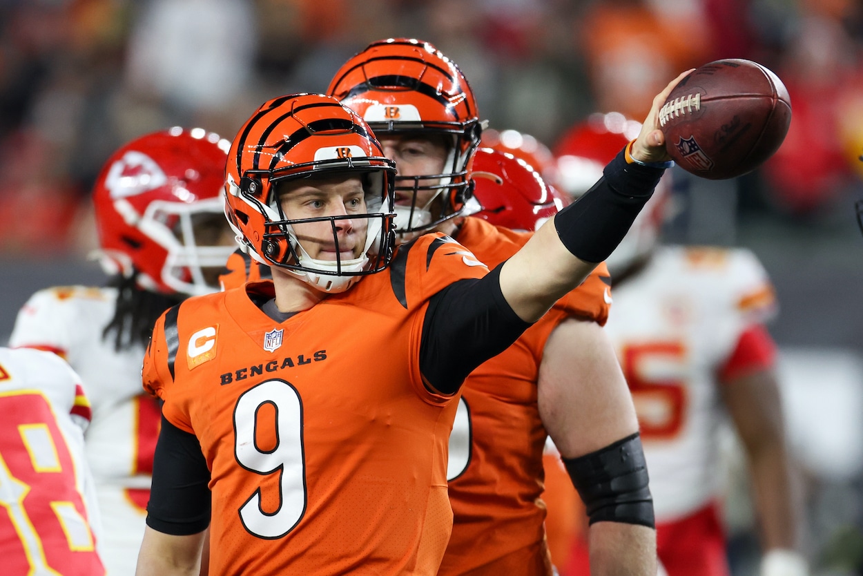 Joe Burrow celebrates after rushing for a first down.