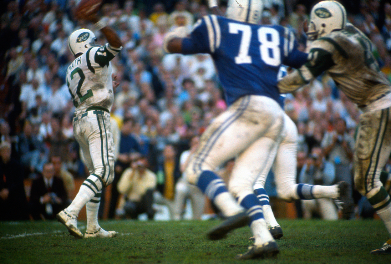 Joe Namath of the New York Jets throws a pass against the Baltimore Colts during Super Bowl 3.