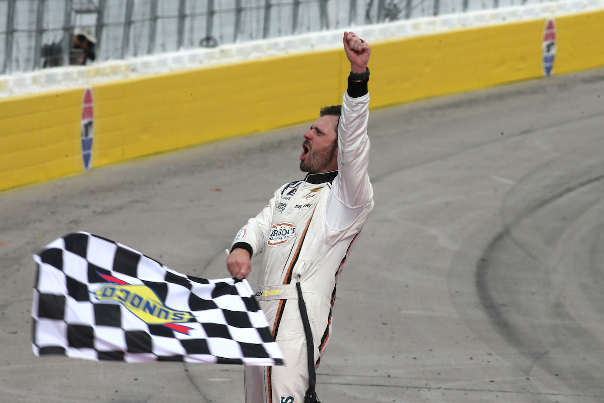 Driver Josh Berry celebrates after winning the 2022 Alsco Uniforms 302 NASCAR Xfinity Series race