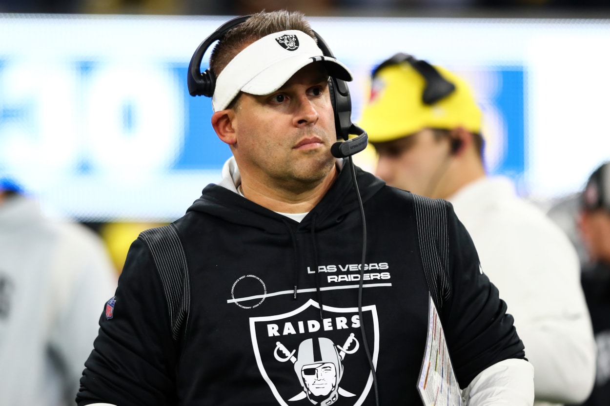 Head coach Josh McDaniels of the Las Vegas Raiders stands on the sidelines.