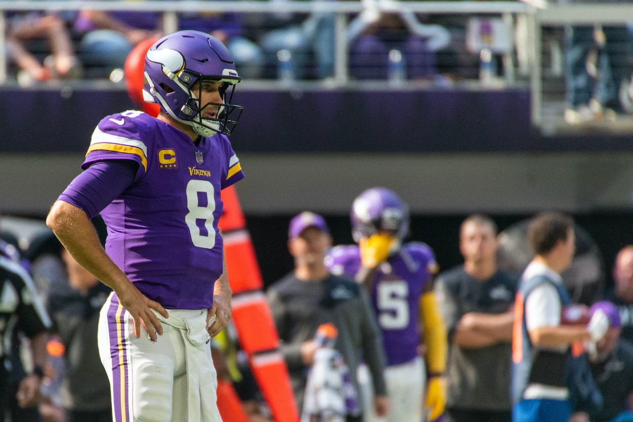 Kirk Cousins looks on against the Lions.