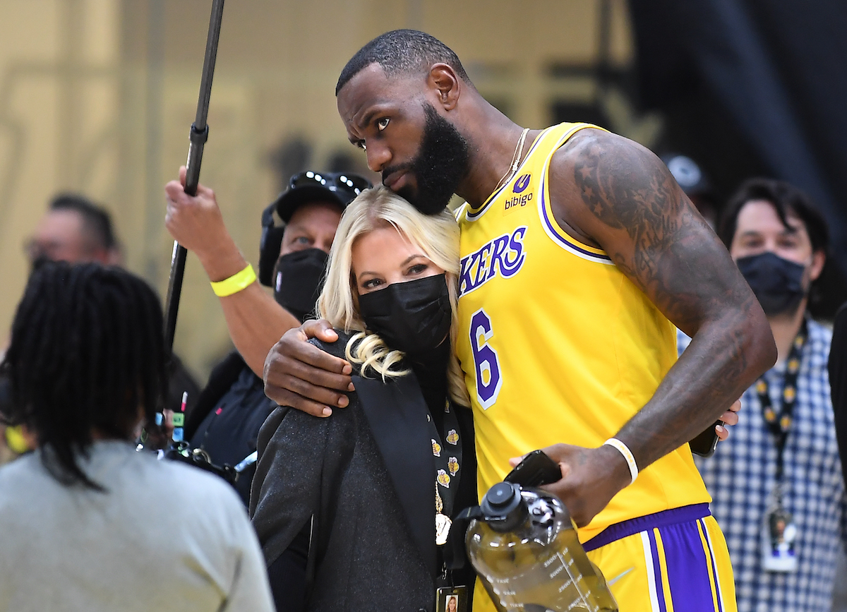 Lakers LeBron James hugs owner Jeanie Buss during media day at the UCLA Health Training Center