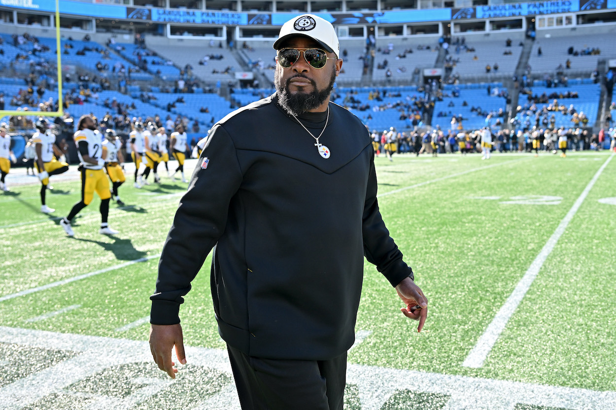 Mike Tomlin looks on before a game.