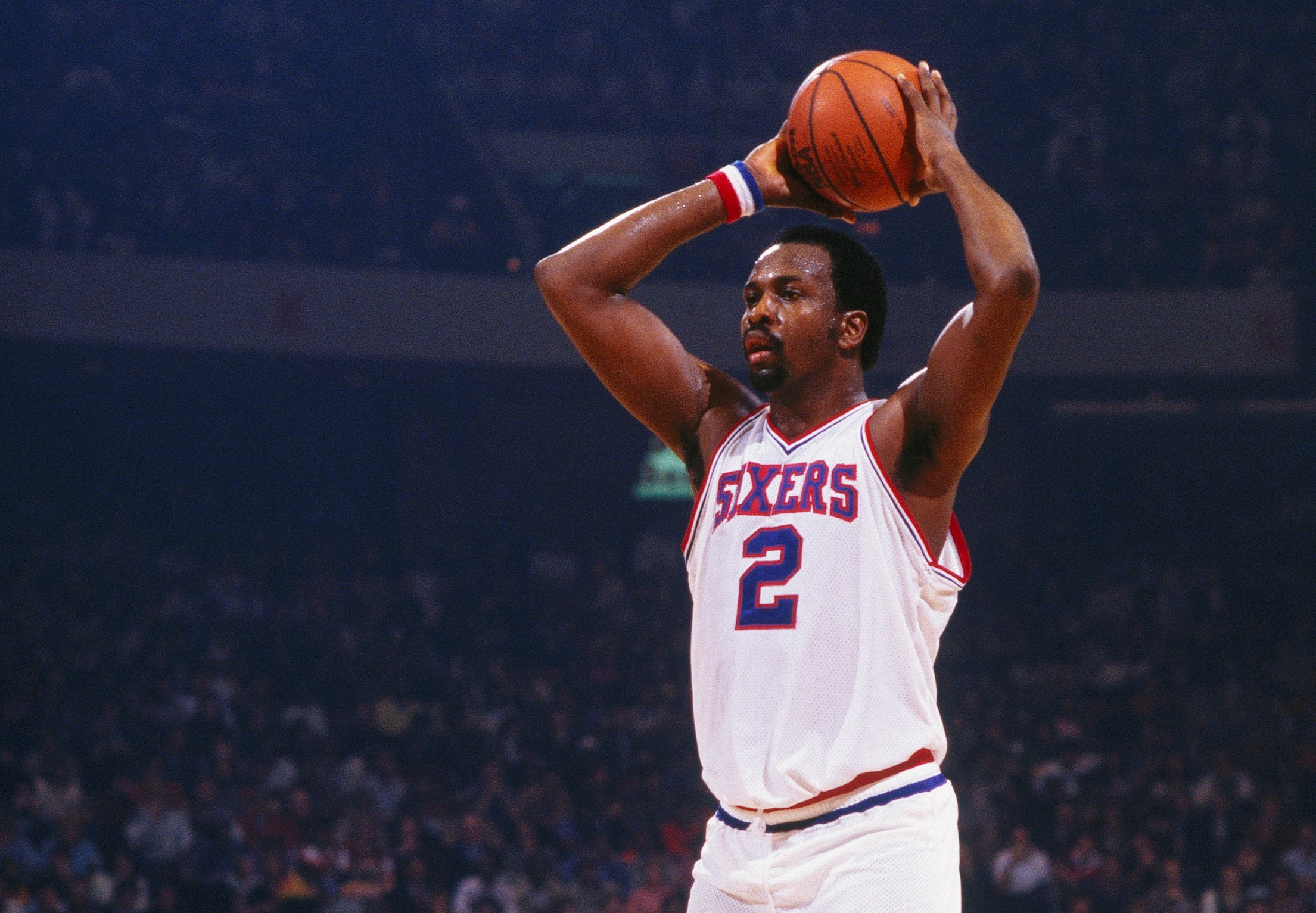 Philadelphia 76ers center Moses Malone passes against the San Diego Clippers.