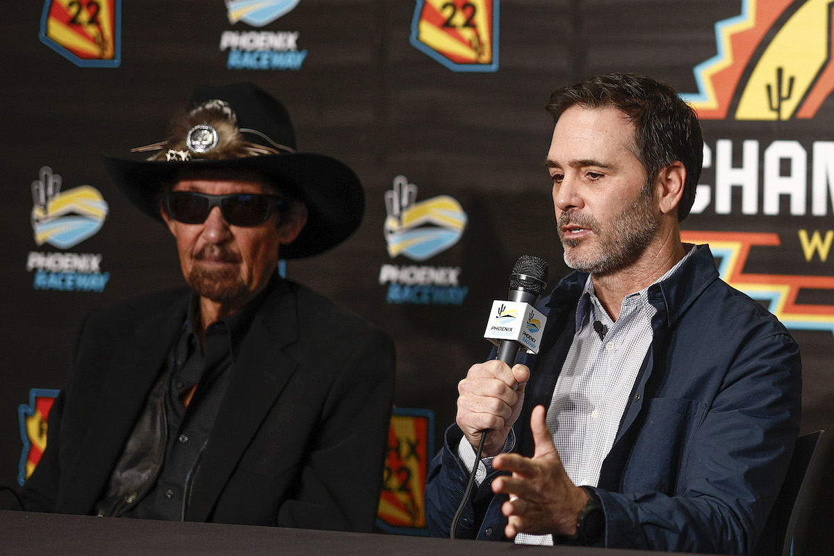 Former NASCAR driver, Jimmie Johnson speaks to the media announcing he has invested in an ownership stake in the Petty GMS Motorsports as team owner, and NASCAR Hall of Famer Richard Petty looks on during a press conference in 2022