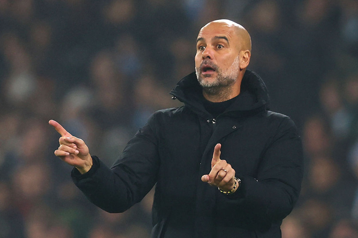 Manchester City manager Pep Guardiola gestures on the touchline.