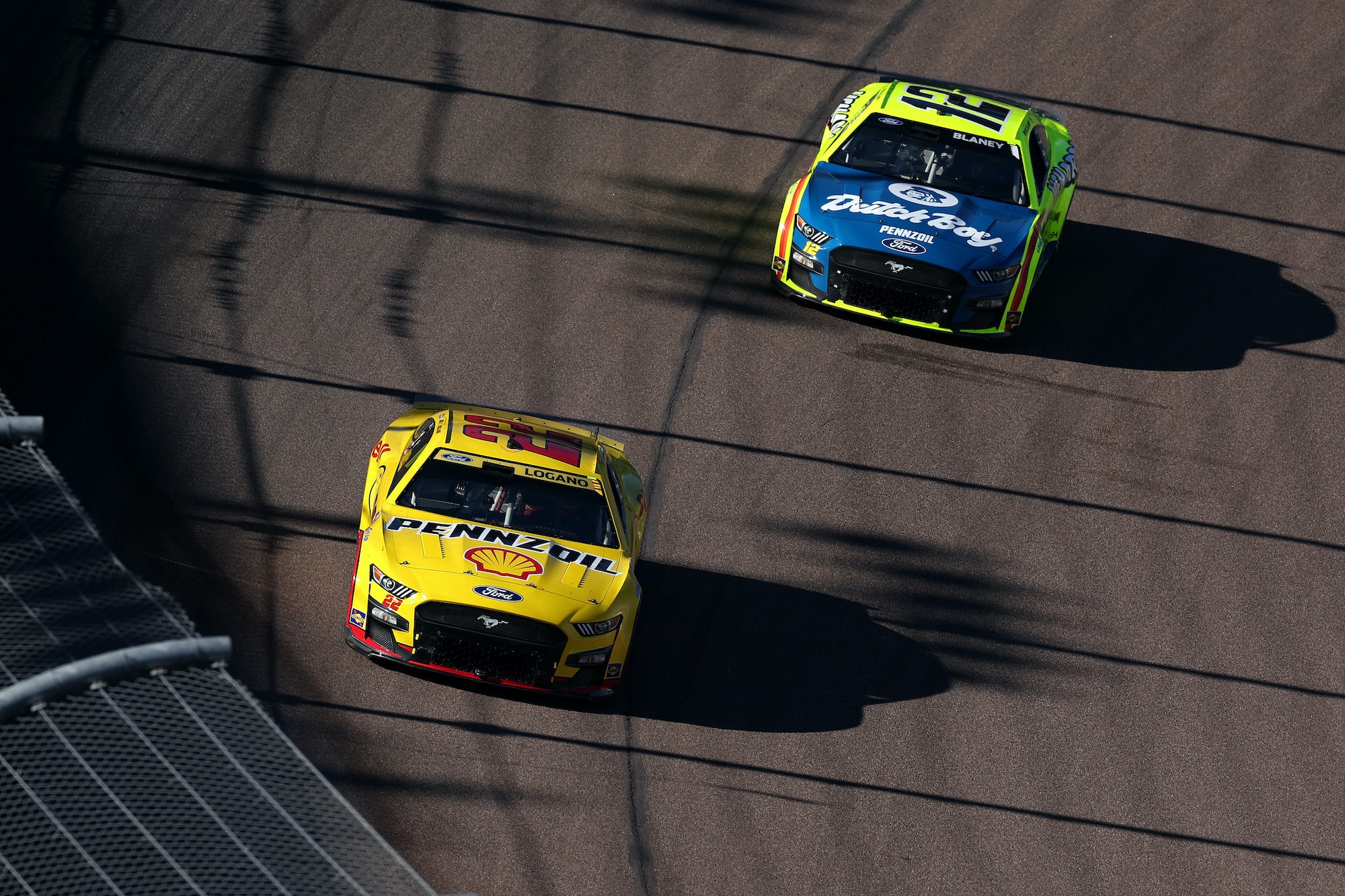 Team Penske drivers Joey Logano and Ryan Blaney race at Phoenix