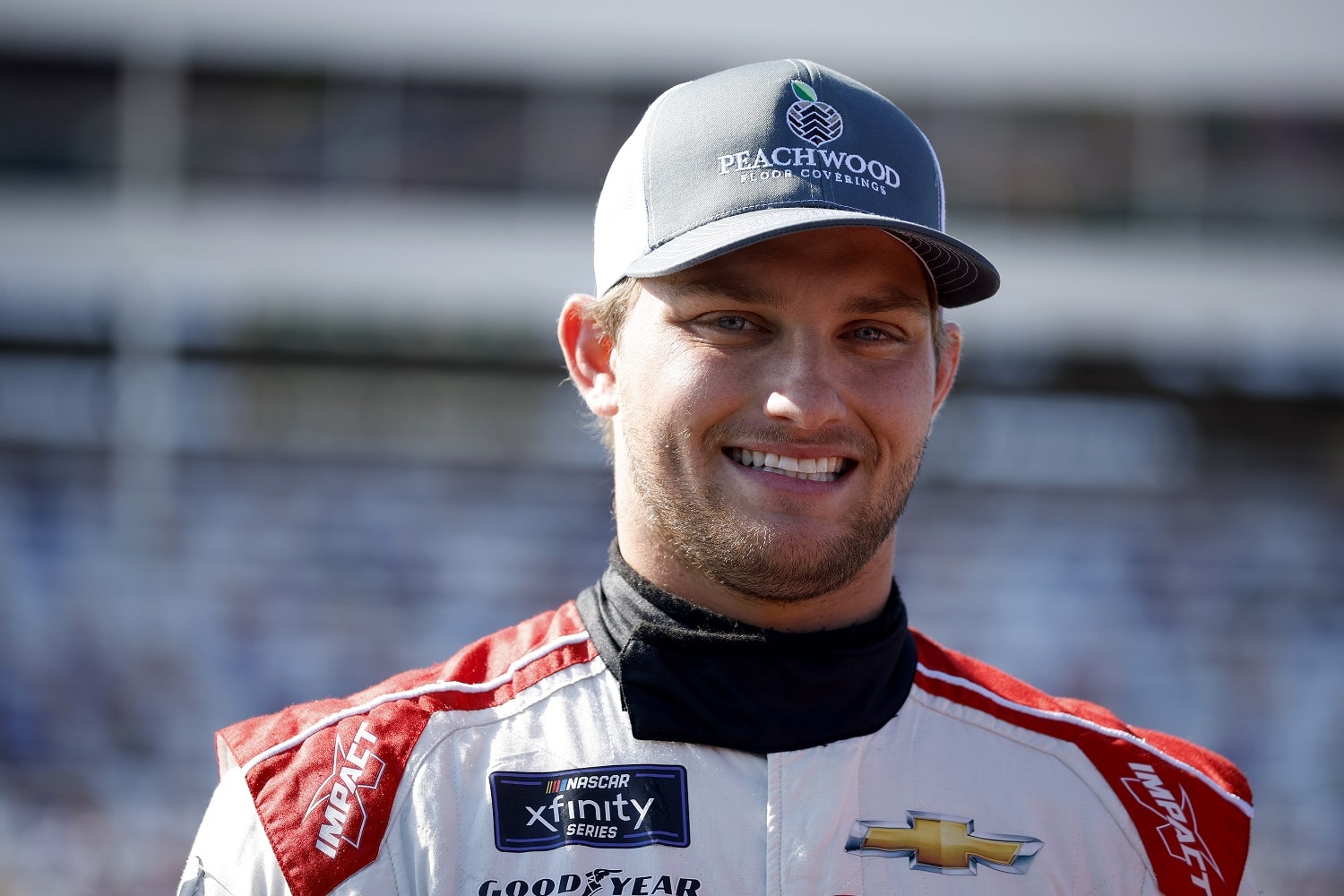 Sage Karam waits on the grid prior to the NASCAR Xfinity Series Drive for the Cure 250 at Charlotte Motor Speedway on Oct. 8, 2022.