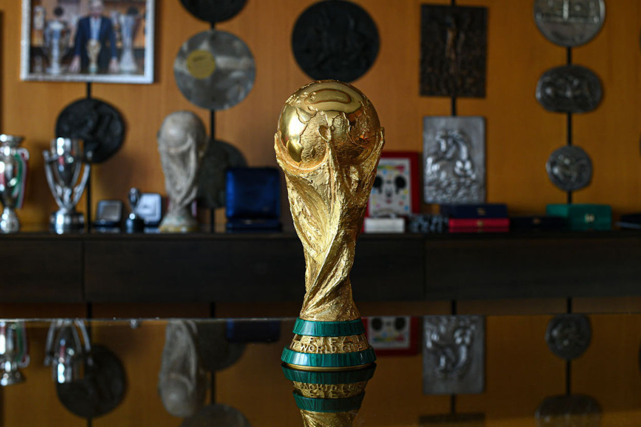 The World Cup Trophy on a desk in a trophy factory.