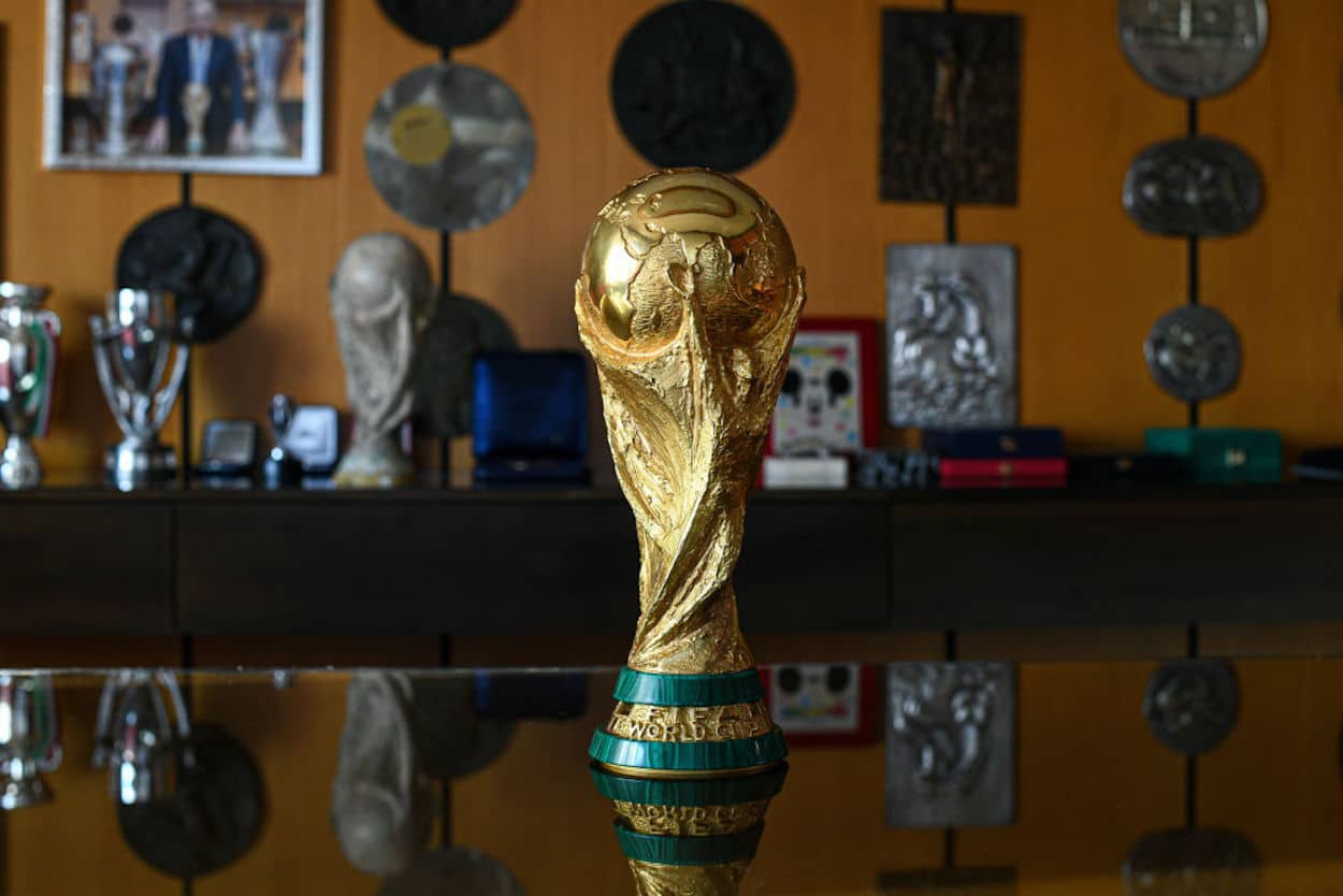 The World Cup Trophy on a desk in a trophy factory.