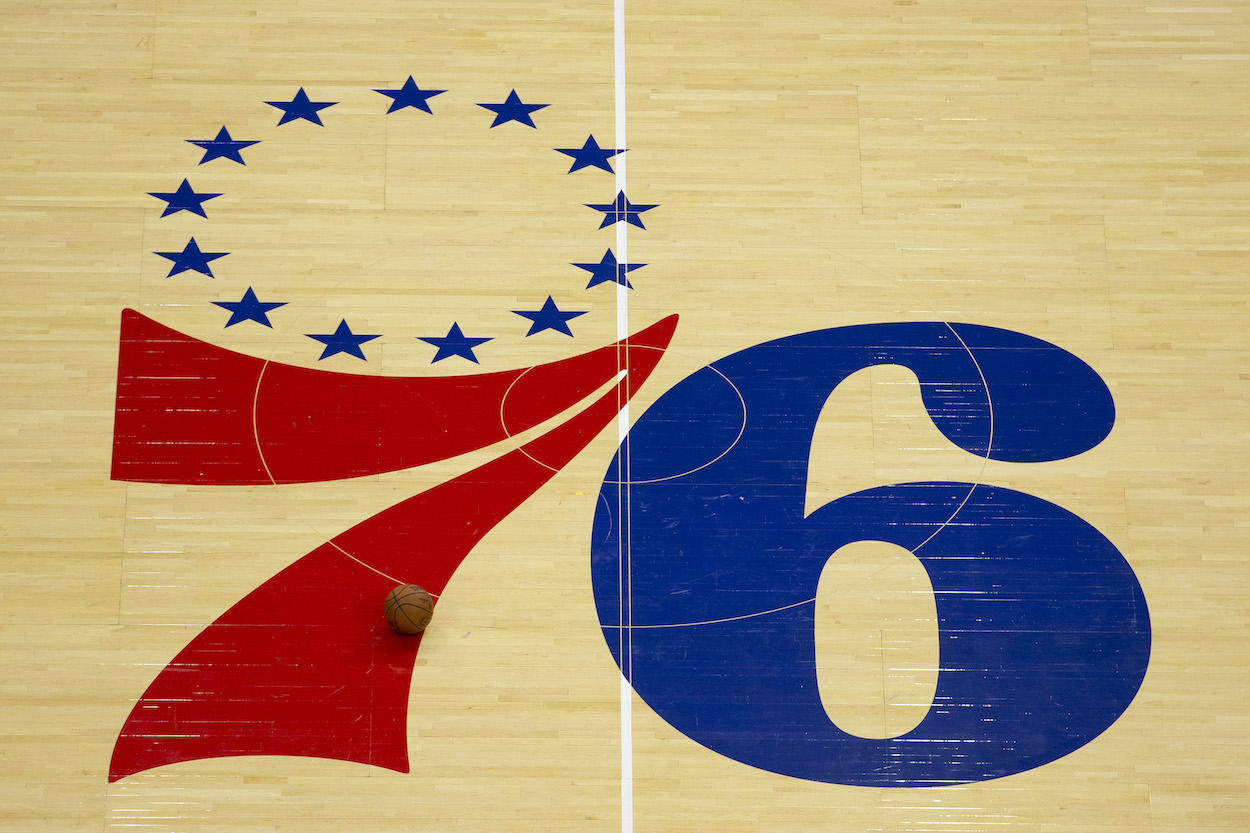 The Philadelphia 76ers logo is shown.