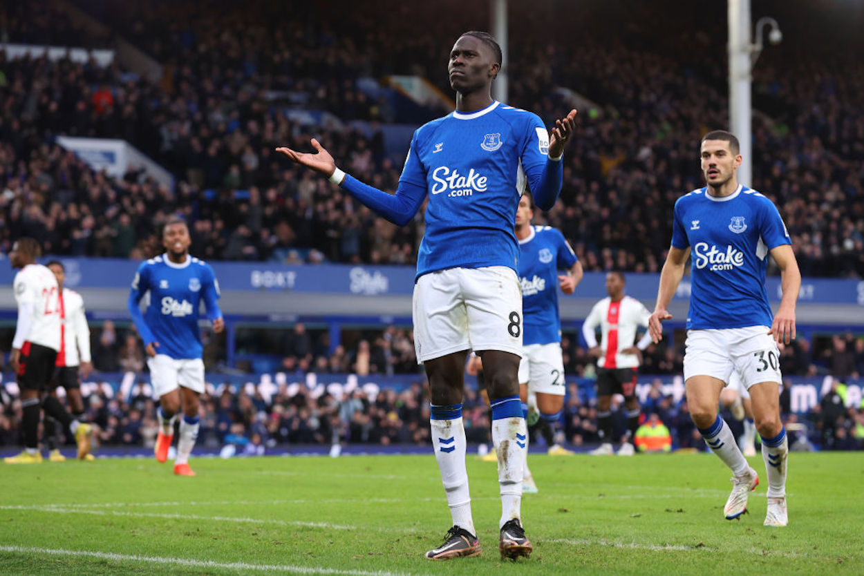 Amadou Onana celebrates scoring a goal for Everton.