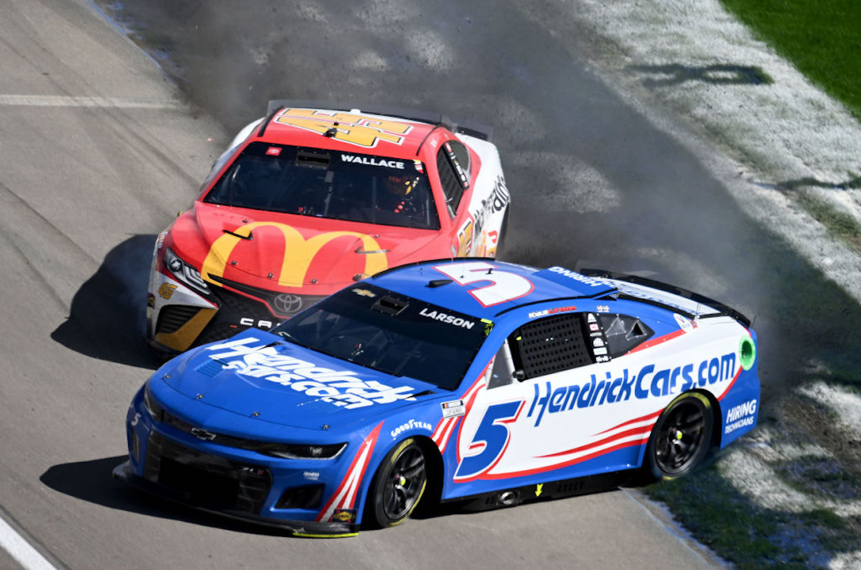 Bubba Wallace (L) and Kyle Larson (R) collide at Las Vegas Motor Speedway.