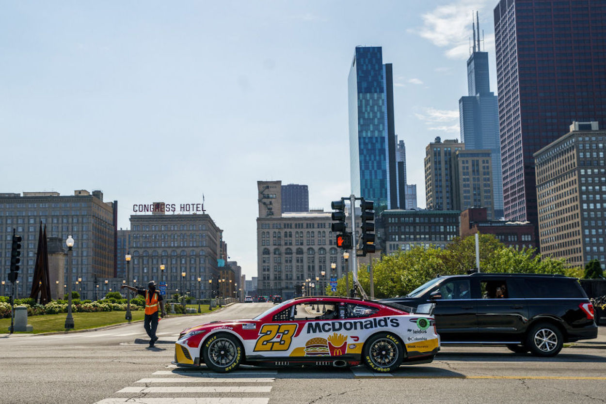Bubba Wallace drives through Chicago to promote NASCAR's street race.