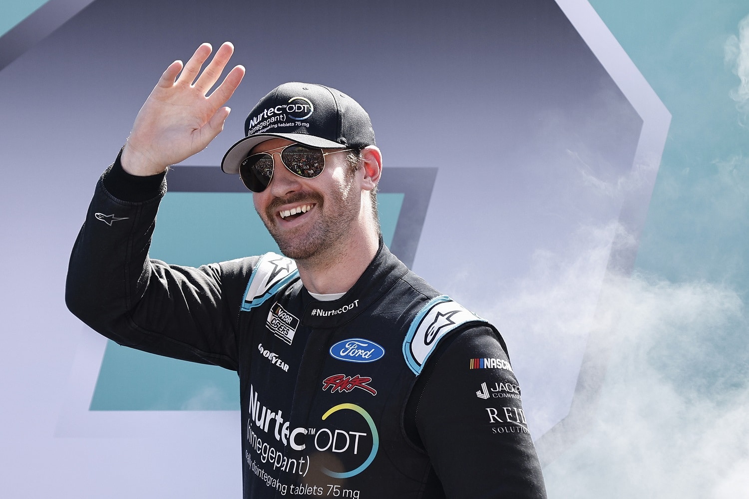 Cody Ware waves to fans during driver intros prior to the NASCAR Cup Series Dixie Vodka 400 at Homestead-Miami Speedway on Oct. 23, 2022. | Sean Gardner/Getty Images