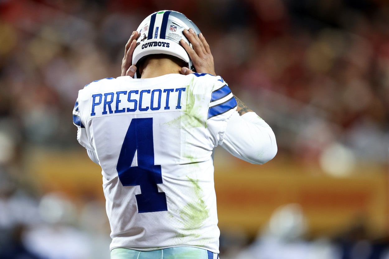 Dak Prescott looks on against the 49ers.