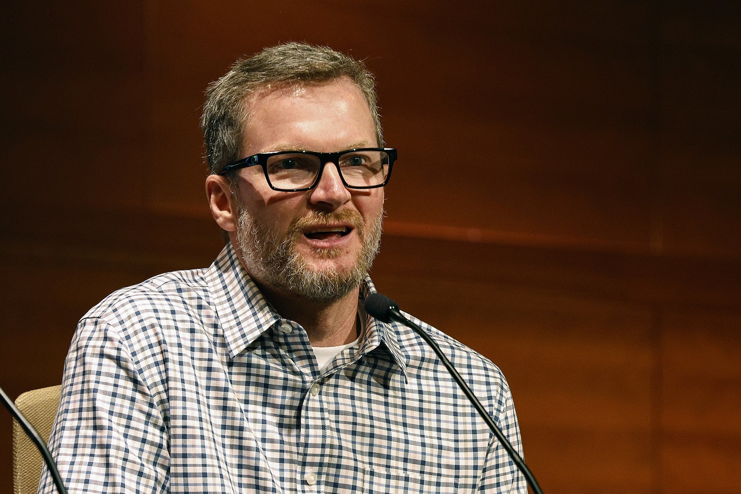 Commentator and Hall of Famer Dale Earnhardt Jr. speaks to reporters during the NASCAR Championship 4 Media Day at Phoenix Raceway on Nov. 3, 2022.