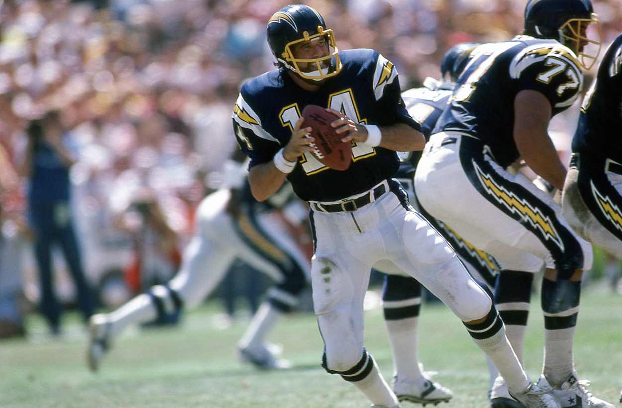 Dan Fouts of the San Diego Chargers drops back to pass at Jack Murphy Stadium.