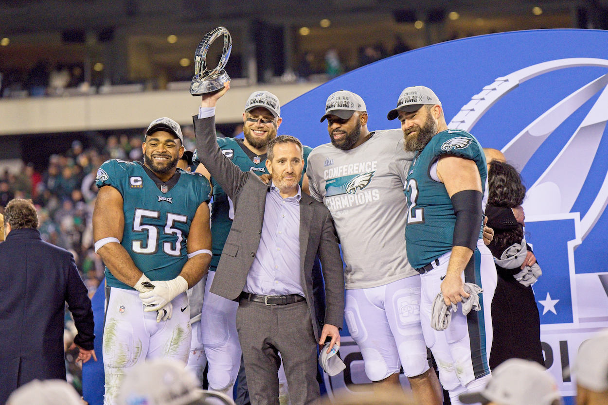 The Philadelphia Eagles celebrate with the NFC Championship trophy.