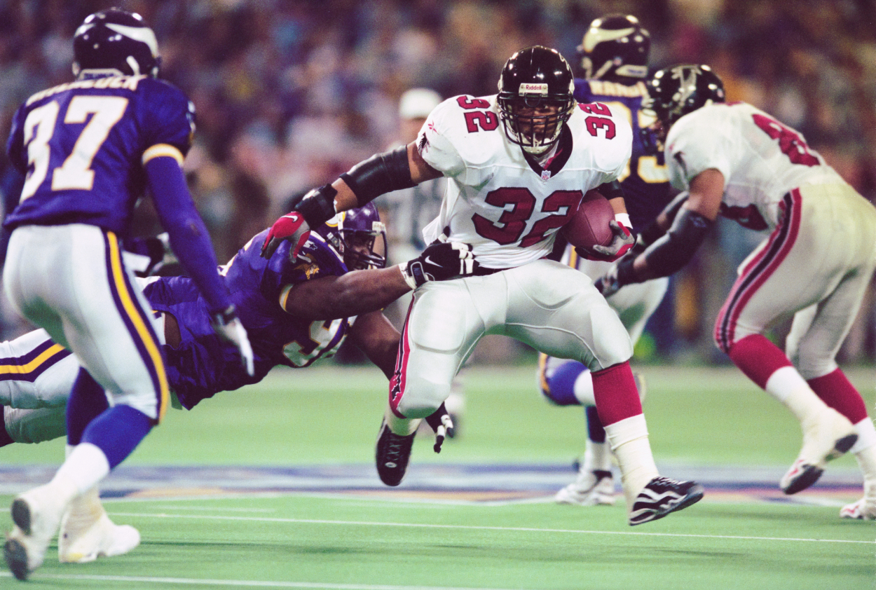 Jamal Anderson of the Atlanta Falcons runs during the NFC Championship game against the Minnesota Vikings.
