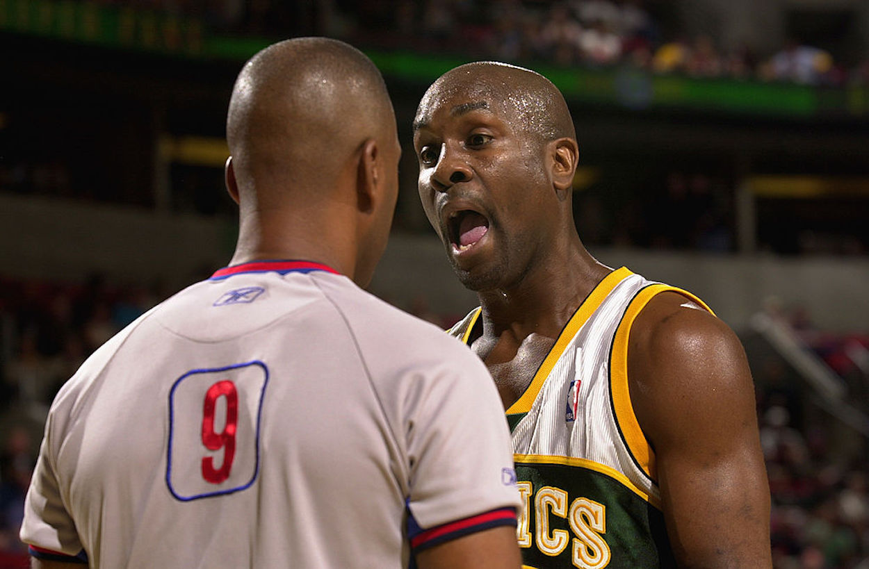 Gary Payton (R) argues with a referee during his time in the NBA.