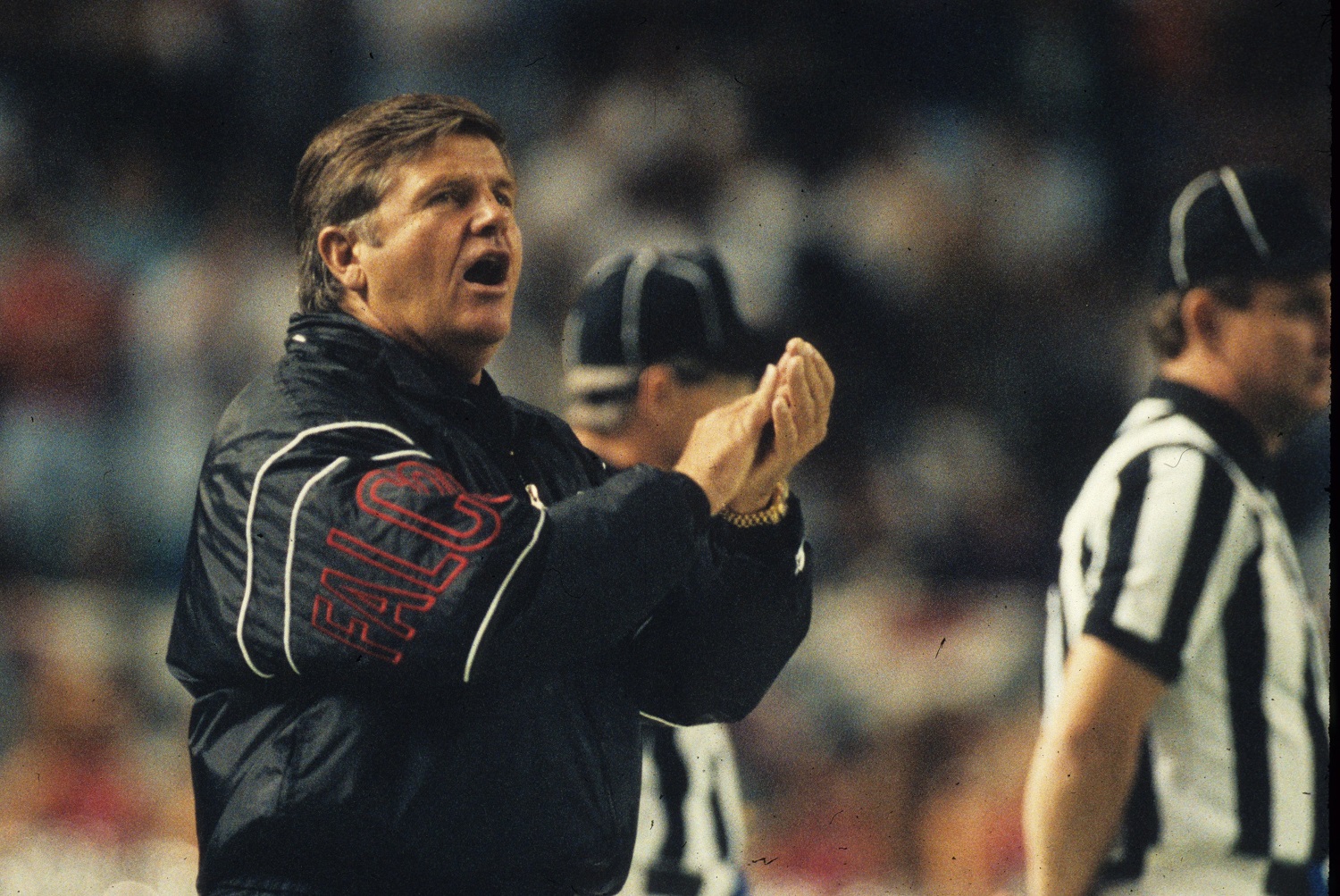 Head coach Jerry Glanville of the Atlanta Falcons encourages his players from the sideline against the New York Jets in the Georgia Dome on Sept. 6, 1992.
